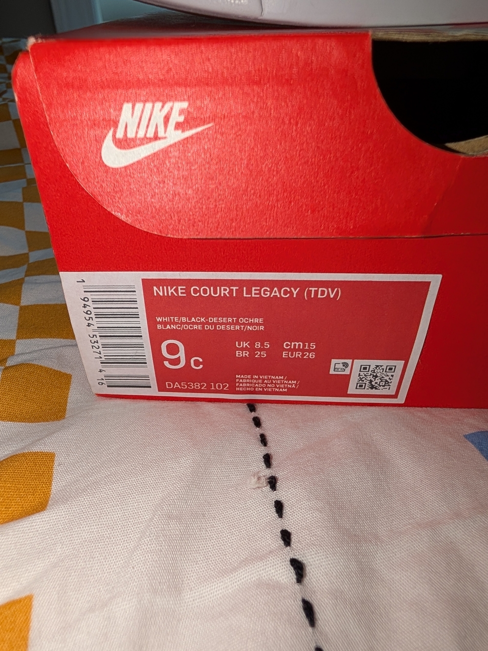 Nike Kids White Sneaker with Black Swoosh and Orange Trim - Picture 3 of 6